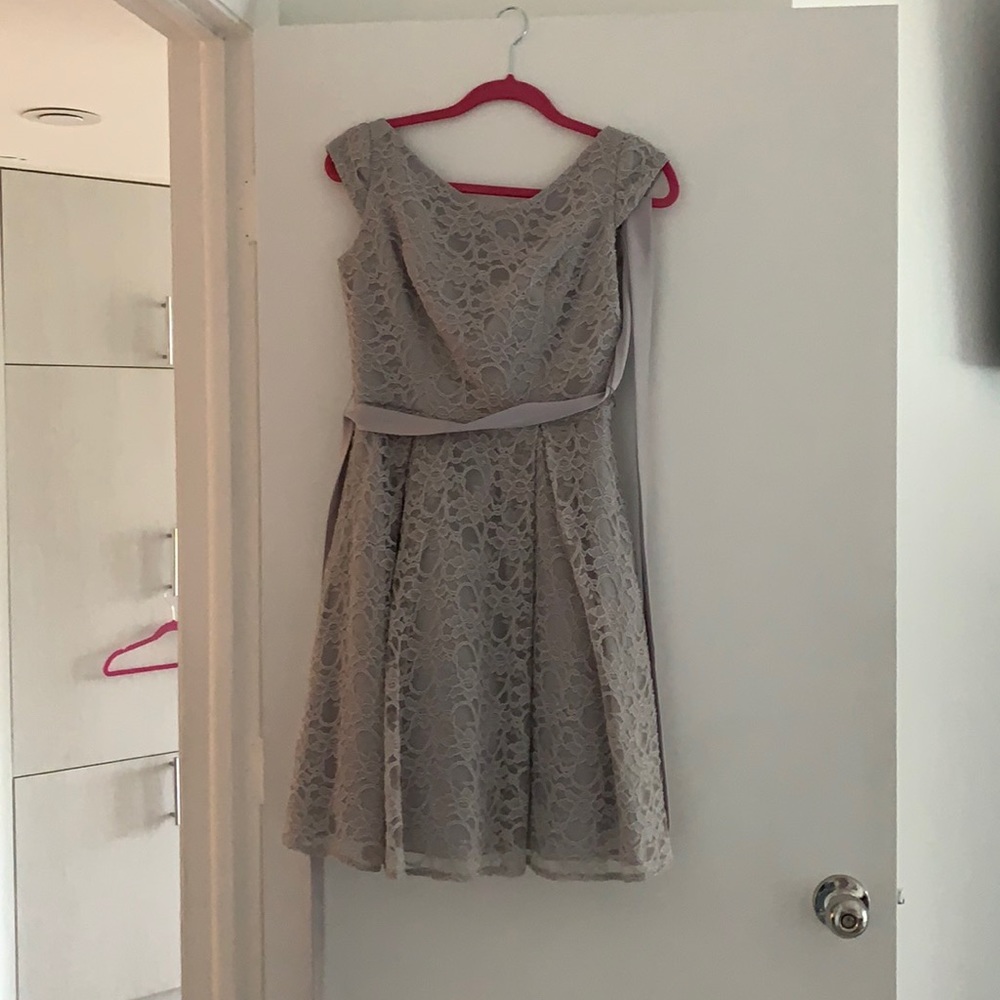 This is a stunning Mori Lee silver dress. Size 8